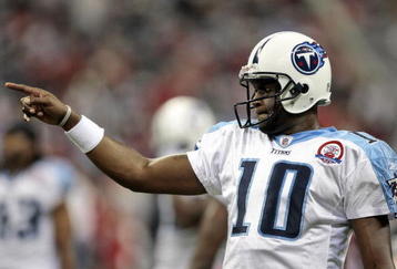 HOUSTON - NOVEMBER 23:  Quarterback Vince Young #10 of the Tennessee Titans warms up prior to taking on the Houston Texans at Reliant Stadium on November 23, 2009 in Houston, Texas.  (Photo by Bob Levey/Getty Images)