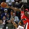 OAKLAND, CA - NOVEMBER 20:  Greg Oden #52 of the Portland Trail Blazers blocks a shot by Monta Ellis #8 of the Golden State Warriors during an NBA game at Oracle Arena on November 20, 2009 in Oakland, California.  (Photo by Jed Jacobsohn/Getty Images)