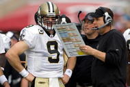 TAMPA, FL - NOVEMBER 22: Quarterback Drew Brees #9 of the New Orleans Saints and head coach Sean Payton talk along the sidelines during the game against the Tampa Bay Buccaneers at Raymond James Stadium on November 22, 2009 in Tampa, Florida. (Photo by J. Meric/Getty Images)
