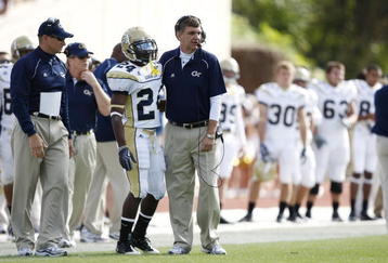 DURHAM, NC - NOVEMBER 14:  Head coach Paul Johnson of the Georgia Tech Yellow Jackets gives instructions to Embry Peeples #24 during the game against the Duke Blue Devils at Wallace Wade Stadium on November 14, 2009 in Durham, North Carolina. (Photo by Joe Robbins/Getty Images)