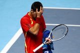 LONDON, ENGLAND - NOVEMBER 25:  Novak Djokovic of Serbia reacts during the men's singles first round match against Robin Soderling of Sweden during the Barclays ATP World Tour Finals at the O2 Arena on November 25, 2009 in London, England.  (Photo by Matthew Lewis/Getty Images for Barclays ATP Finals)