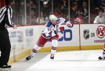NEWARK, NJ - OCTOBER 05:  Chris Drury #23 of the New York Rangers skates for the puck during the game against the New Jersey Devils at the Prudential Center on October 5, 2009 in Newark, New Jersey.  (Photo by Bruce Bennett/Getty Images)