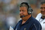 SOUTH BEND, IN - SEPTEMBER 19: Head coach Charlie Weis of the Notre Dame Fighting Irish watches as his team takes on the Michigan State Spartans on September 19, 2009 at Notre Dame Stadium in South Bend, Indiana. Notre Dame defeated Michigan State 33-30. (Photo by Jonathan Daniel/Getty Images)