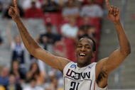 GLENDALE, AZ - MARCH 28:   Forward Stanley Robinson #21 of the Connecticut Huskies celebrates after winning the West Region by defeating the Missouri Tigers 82-75 in the Elite Eight of the NCAA Division I Men's Basketball Tournament at the University of Phoenix Stadium on March 28, 2009 in Glendale, Arizona.  (Photo by Ronald Martinez/Getty Images)