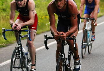BELLINGHAM, WA - JUNE 13:   Matt Reed #5 leads Hunter Kemper #1and Andy Potts #2 during the U.S. Olympic Triathlon Team Trials on June 13, 2004 at Bloedel Donavan Park in Bellingham, Washington. (Photo by Jonathan Ferrey/Getty Images)