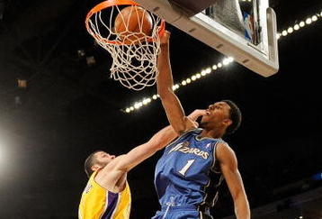 LOS ANGELES, CA - JANUARY 22:  Nick Young #1 of the Washington Wizards dunks against Vladimir Radmanovic #10 of the Los Angeles Lakers during the fourth quarter at the Staples Center January 22, 2009 in Los Angeles, California. NOTE TO USER: User expressly acknowledges and agrees that, by downloading and/or using this Photograph, user is consenting to the terms and conditions of the Getty Images License Agreement.  (Photo by Kevork Djansezian/Getty Images)