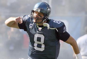 SEATTLE - OCTOBER 11: Quarterback Matt Hasselbeck #8 of the Seattle Seahawks celebrates as he runs onto the field before the game against the Jacksonville Jaguars on October 11, 2009 at Qwest Field in Seattle, Washington. The Seahawks defeated the Jaguars 41-0. (Photo by Otto Greule Jr/Getty Images)  