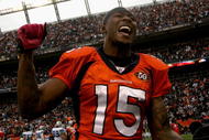 DENVER - OCTOBER 04: Brandon Marshall #15 of the Denver Broncos celebrates after the final play against the Dallas Cowboys during NFL action at Invesco Field at Mile High on October 4, 2009 in Denver, Colorado. Marshall caught the game winning 51 yard touchdown reception against the Dallas Cowboys with 2:47 remaining in the fourth quarter as the Broncos defeated the Cowboys 17-10. (Photo by Doug Pensinger/Getty Images)