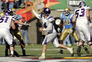 EL PASO, TX - DECEMBER 30:  Quarterback Brett Basanez #14 of the Northwestern Wildcats throws against the UCLA Bruins in the second quarter during the Vitalis Sun Bowl on December 30, 2005 at the Sun Bowl in El Paso, Texas. The Bruins defeated the Wildcats 50-38.  (Photo by Brian Bahr/Getty Images)