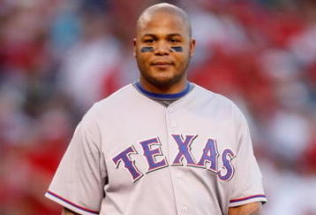 ANAHEIM, CA - OCTOBER 01:  Andruw Jones #25 of the Texas Rangers looks on against the Los Angeles Angels of Anaheim at Angel Stadium on October 1, 2009 in Anaheim, California. The Rangers defeated the Angels 11-3.  (Photo by Jeff Gross/Getty Images)
