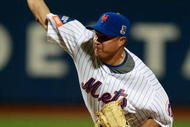 NEW YORK - AUGUST 22: Elmer Dessens #64 of the New York Mets pitches against the Philadelphia Phillies during the game on August 22, 2009 at Citi Field in the Flushing neighborhood of the Queens borough of New York City. (Photo by Jared Wickerham/Getty Images)