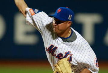 NEW YORK - AUGUST 22:  Elmer Dessens #64 of the New York Mets pitches against the Philadelphia Phillies during the game on August 22, 2009 at Citi Field in the Flushing neighborhood of the Queens borough of New York City.  (Photo by Jared Wickerham/Getty Images)