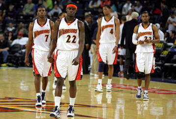 OAKLAND, CA - NOVEMBER 06:  Kelenna Azubuike #7, Anthony Morrow #22, Anthony Randolph #4 and C.J. Watson #23 of the Golden State Warriors walk back on to the court after a time out late in their loss to the Los Angeles Clippers at Oracle Arena on November 6, 2009 in Oakland, California. NOTE TO USER: User expressly acknowledges and agrees that, by downloading and/or using this Photograph, User is consenting to the terms and conditions of the Getty Images License Agreement.  (Photo by Ezra Shaw/Getty Images)