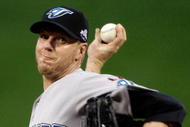 ST LOUIS, MO - JULY 14:  American League All-Star Roy Halladay of the Toronto Blue Jays pitches during the 2009 MLB All-Star Game at Busch Stadium on July 14, 2009 in St Louis, Missouri.  (Photo by Morry Gash-Pool/Getty Images)