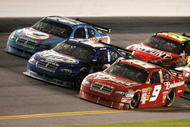 DAYTONA BEACH, FL - FEBRUARY 07: AJ Allmendinger, driver of the #10 Valvoline Dodge, races along side Kurt Busch, driver of the #2 Miller Lite Dodge, and Kasey Kahne, driver of the #9 Budweiser Dodge, during the NASCAR Sprint Cup Series Budweiser Shootout at Daytona International Speedway on February 7, 2009 in Daytona Beach, Florida. (Photo by Jerry Markland/Getty Images for NASCAR)