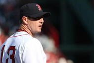 BOSTON - OCTOBER 11:  Pitcher Billy Wagner #13 of the Boston Red Sox replaces Daniel Bard #60 in the eight inning of Game Three of the ALDS against the Los Angeles Angels of Anaheim during the 2009 MLB Playoffs at Fenway Park on October 11, 2009 in Boston, Massachusetts. (Photo by Elsa/Getty Images)