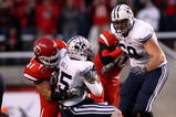 SALT LAKE CITY - NOVEMBER 22:  Max Hall #15 of the BYU Cougarsis sacked by Tatum Drecksel #47 of  the Utah Utes at Rice-Eccles Stadium on November 22, 2008 in Salt Lake City, Utah.  (Photo by Jonathan Ferrey/Getty Images)