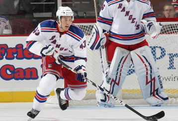 NEWARK, NJ - SEPTEMBER 16: Michael Del Zotto #43 of the New York Rangers skates against the New Jersey Devils at the Prudential Center on September 16, 2009 in Newark, New Jersey. The Devils defeated the Rangers 3-2 in the shoot out. (Photo by Bruce Bennett/Getty Images)