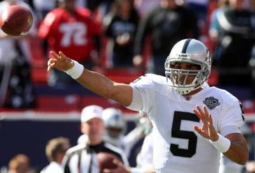 EAST RUTHERFORD, NJ - OCTOBER 11:  Bruce Gradkowski #5 of the Oakland Raiders warms up before playing the New York Giants on October 11, 2009 at Giants Stadium in East Rutherford, New Jersey.  (Photo by Jim McIsaac/Getty Images)