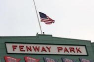 BOSTON - AUGUST 26:  The U.S. flag flies at half staff in honor of the late U.S. Sen. Ted Kennedy (D-MA) before the Boston Red Sox take on the Chicago White Sox on August 26, 2009 at Fenway Park in Boston, Massachusetts.  (Photo by Elsa/Getty Images)