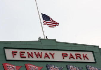 BOSTON - AUGUST 26:  The U.S. flag flies at half staff in honor of the late U.S. Sen. Ted Kennedy (D-MA) before the Boston Red Sox take on the Chicago White Sox on August 26, 2009 at Fenway Park in Boston, Massachusetts.  (Photo by Elsa/Getty Images)