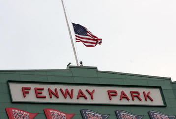 BOSTON - AUGUST 26:  The U.S. flag flies at half staff in honor of the late U.S. Sen. Ted Kennedy (D-MA) before the Boston Red Sox take on the Chicago White Sox on August 26, 2009 at Fenway Park in Boston, Massachusetts.  (Photo by Elsa/Getty Images)