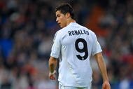 MADRID, SPAIN - NOVEMBER 25:  Cristiano Ronaldo of Real Madrid looks on during the Champions League group C match between Real Madrid and FC Zurich at the Estadio Santiago Bernabeu on November 25, 2009 in Madrid, Spain. Real Madrid won the match 1-0.  (Photo by Jasper Juinen/Getty Images)