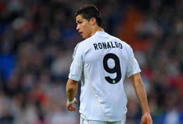 MADRID, SPAIN - NOVEMBER 25:  Cristiano Ronaldo of Real Madrid looks on during the Champions League group C match between Real Madrid and FC Zurich at the Estadio Santiago Bernabeu on November 25, 2009 in Madrid, Spain. Real Madrid won the match 1-0.  (Photo by Jasper Juinen/Getty Images)