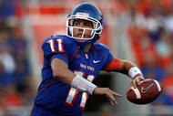 BOISE , ID - SEPTEMBER 13:  Kellen Moore #11 of the Boise State Broncos throws the ball against the Bowling Green Falcons at Bronco Stadium on September 13, 2008 in Boise, Idaho.  (Photo by Jonathan Ferrey/Getty Images)