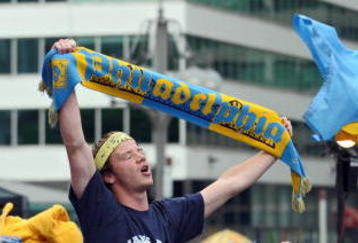 PHILADELPHIA - MAY 11:  Soccer fans cheer as the Philadelphia Union soccer team of the MLS release their name, colors and logo at a press conference on May 11, 2009 at City Hall in Philadelphia, Pennsylvania. (Photo by Drew Hallowell/Getty Images for Philadelphia Union)