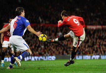 MANCHESTER, ENGLAND - OCTOBER 31: Dimitar Berbatov of Manchester United scores the first goal  during the Barclays Premier League match between Manchester United and Blackburn Rovers at Old Trafford on October 31, 2009 in Manchester, England.  (Photo by Michael Regan/Manchester United)
