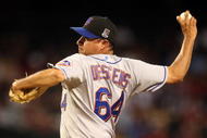 PHOENIX - AUGUST 10: Relief pitcher Elmer Dessens #64 of the New York Mets pitches against the Arizona Diamondbacks during the major league baseball game at Chase Field on August 10, 2009 in Phoenix, Arizona. The Diamondbacks defeated the Mets 7-4. (Photo by Christian Petersen/Getty Images)