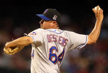 PHOENIX - AUGUST 10:  Relief pitcher Elmer Dessens #64 of the New York Mets pitches against the Arizona Diamondbacks during the major league baseball game at Chase Field on August 10, 2009 in Phoenix, Arizona.  The Diamondbacks defeated the Mets 7-4.  (Photo by Christian Petersen/Getty Images)