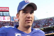 EAST RUTHERFORD, NJ - NOVEMBER 22: Eli Manning #10 of the New York Giants looks on after their game against the Atlanta Falcons on November 22, 2009 at Giants Stadium in East Rutherford, New Jersey. The Giants defeated the Falcons 34-31 in overtime. (Photo by Jim McIsaac/Getty Images)