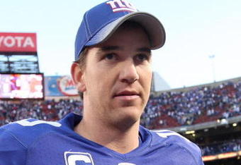 EAST RUTHERFORD, NJ - NOVEMBER 22:  Eli Manning #10 of the New York Giants looks on after their game against the Atlanta Falcons  on November 22, 2009 at Giants Stadium in East Rutherford, New Jersey. The Giants defeated the Falcons 34-31 in overtime.  (Photo by Jim McIsaac/Getty Images)