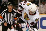 SAN JOSE, CA - NOVEMBER 25:  Marian Hossa #81 of the Chicago Blackhawks is stopped by goalie Evgeni Nabokov #20 of the San Jose Sharks during their game at HP Pavilion on November 25, 2009 in San Jose, California.  (Photo by Ezra Shaw/Getty Images)