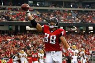 ATLANTA - NOVEMBER 08:  Tony Gonzalez #88 of the Atlanta Falcons scores a touchdown against the Washington Redskins at Georgia Dome on November 8, 2009 in Atlanta, Georgia.  (Photo by Kevin C. Cox/Getty Images)