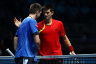 LONDON, ENGLAND - NOVEMBER 25: Novak Djokovic of Serbia greets Robin Soderling of Sweden after the men's singles first round match during the Barclays ATP World Tour Finals at the O2 Arena on November 25, 2009 in London, England. (Photo by Julian Finney/Getty Images)