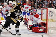 PITTSBURGH - NOVEMBER 25:  Ruslan Fedotenko #26 of the Pittsburgh Penguins loses control of the puck as he moves in on goaltender Carey Price #31 of the Montreal Canadiens on November 25, 2009 at Mellon Arena in Pittsburgh, Pennsylvania.  (Photo by Jamie Sabau/Getty Images)