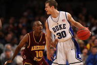 NEW YORK - NOVEMBER 25: Jon Scheyer #30 of the Duke Blue Devils dribbles the ball in front of Jamelle McMillan #10 of the Arizona State Sun Devils at Madison Square Garden on November 25, 2009 in New York, New York.  (Photo by Nick Laham/Getty Images)