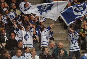 TORONTO, ON - MAY 10 :  Toronto Maple Leaf fans wave flags during game 5 of the NHL Eastern Conference semifinal series against the Ottawa Senators at Air Canada Centre in Toronto, Ontario, Canada on May 10, 2002. The Senators won 4-2. (Photo by Dave Sandford/Getty Images)