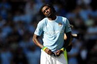 MANCHESTER, ENGLAND - SEPTEMBER 12:  Emmanuel Adebayor of Manchester and William Gallas of Arsenal prepare for the Barclays Premier League match between Manchester City and Arsenal at the City of Manchester Stadium on September 12, 2009 in Manchester, England.  (Photo by Shaun Botterill/Getty Images)