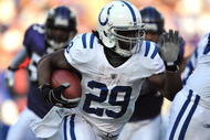 BALTIMORE - NOVEMBER 22: Joseph Addai #29 of the Indianapolis Colts runs the ball against the Baltimore Ravens at M&T Bank Stadium on November 22, 2009 in Baltimore, Maryland. The Colts defeated the Ravens 17-15. (Photo by Larry French/Getty Images)