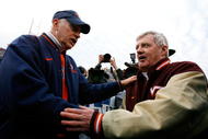 CHARLOTTESVILLE, VA - NOVEMBER 24:  Head coach Al Groh (L) of the Virginia Cavaliers congratulates head coach Frank Beamer of the Virginia Tech Hokies after after the Hokies 33-21 win at Scott Stadium on November 24, 2007 in Charlottesville, Virginia.  (Photo by Kevin C. Cox/Getty Images)