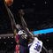 ORLANDO, FL - NOVEMBER 11: J.J. Hickson #21 of the Cleveland Cavaliers puts up a shot under pressure over Brandon Bass #30 of the Orlando Magic during the game on November 11, 2009 at Amway Arena in Orlando, Florida. NOTE TO USER: User expressly acknowledges and agrees that, by downloading and/or using this Photograph, user is consenting to the terms and conditions of the Getty Images License Agreement. (Photo by Sam Greenwood/Getty Images)