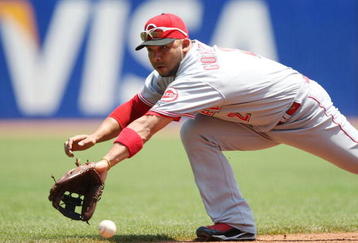 SAN FRANCISCO - AUGUST 9:  Alex Gonzalez of the Cincinnati Reds can't make a play on a single hit by Aaron Rowand #33 of the San Francisco Giants in the bottom of the second inning at AT&T Park  on August 9, 2009 in San Francisco, California.  (Photo by Jed Jacobsohn/Getty Images)