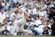 LOS ANGELES, CA - OCTOBER 08:  Albert Pujols #5 of the St. Louis Cardinals hits a single in the fifth inning against the Los Angeles Dodgers in Game Two of the NLDS during the 2009 MLB Playoffs at Dodger Stadium on October 8, 2009 in Los Angeles, California.  (Photo by Jeff Gross/Getty Images)