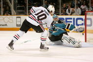 SAN JOSE, CA - NOVEMBER 25:  Patrick Sharp #10 of the Chicago Blackhawks scores a shorthanded goal against Evgeni Nabokov #20 of the San Jose Sharks during their game at HP Pavilion on November 25, 2009 in San Jose, California.  (Photo by Ezra Shaw/Getty Images)