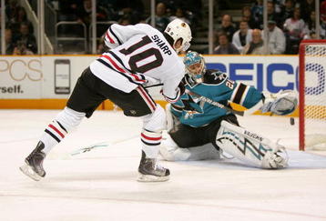 SAN JOSE, CA - NOVEMBER 25:  Patrick Sharp #10 of the Chicago Blackhawks scores a shorthanded goal against Evgeni Nabokov #20 of the San Jose Sharks during their game at HP Pavilion on November 25, 2009 in San Jose, California.  (Photo by Ezra Shaw/Getty Images)