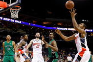 CHARLOTTE, NC - MARCH 16:  Chris Bosh #4 of the Toronto Raptors watches as Boris Diaw #32 of the Charlotte Bobcats grabs a rebound during their game at Time Warner Cable Arena on March 16, 2009 in Charlotte, North Carolina.  NOTE TO USER: User expressly acknowledges and agrees that, by downloading and/or using this Photograph, user is consenting to the terms and conditions of the Getty Images License Agreement.  (Photo by Streeter Lecka/Getty Images)